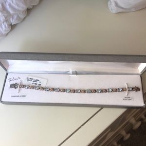 Genuine blue topaz diamond accent bracelet